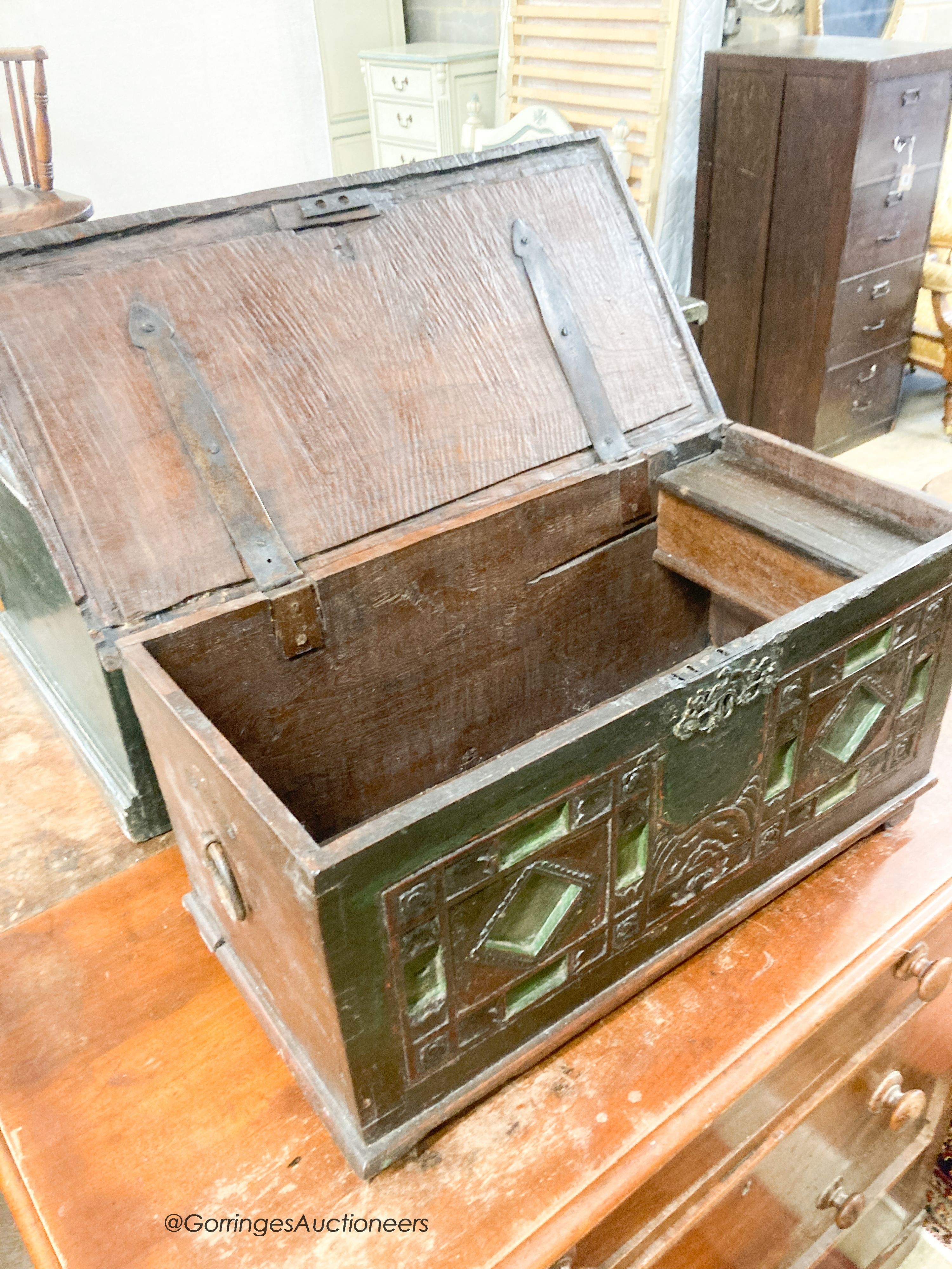 A small painted carved hardwood trunk, length 62cm, depth 30cm, height 32cm